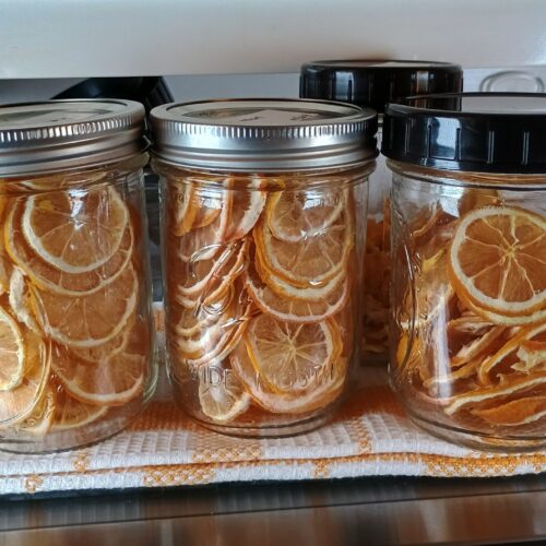 dehydrated lemon slices in mason jars