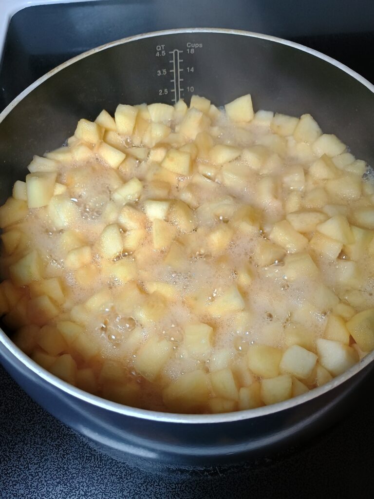 Apples simmering in a pot